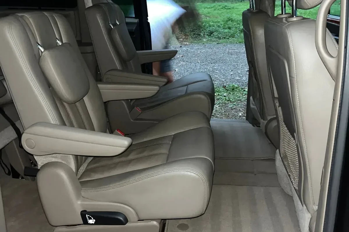 Cleaned minivan cabin with seats and carpets finished